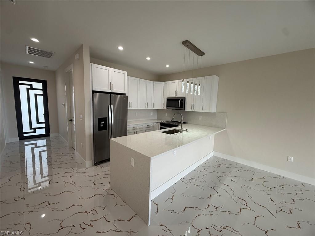 Interior, Kitchen, Marble, Pendant Lights, Recessed Lighting, Stainless Steel Appliances