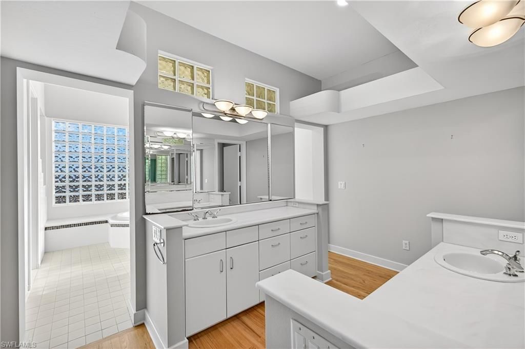 Bathroom, Dual Sink Vanities, Interior, Recessed Lighting, Wood Texture Flooring
