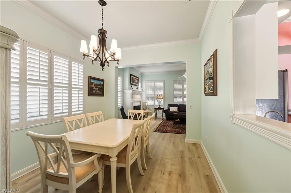 Chandelier, Dining room, Fireplace, Interior, Living room, Wood Texture Flooring