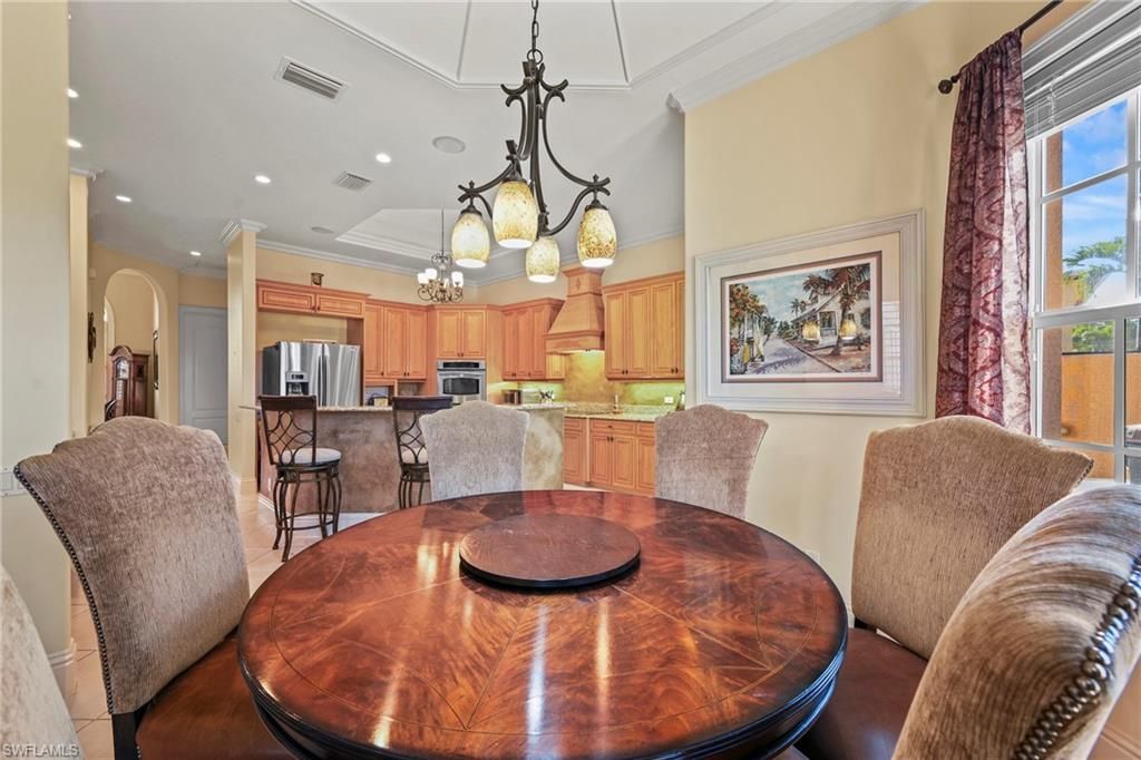 Chandelier, Dining room, Interior, Kitchen, Recessed Lighting, Stainless Steel Appliances, Wood Texture Flooring