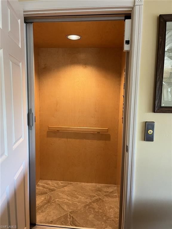 Elevator, Interior, Recessed Lighting, Wooden Walls