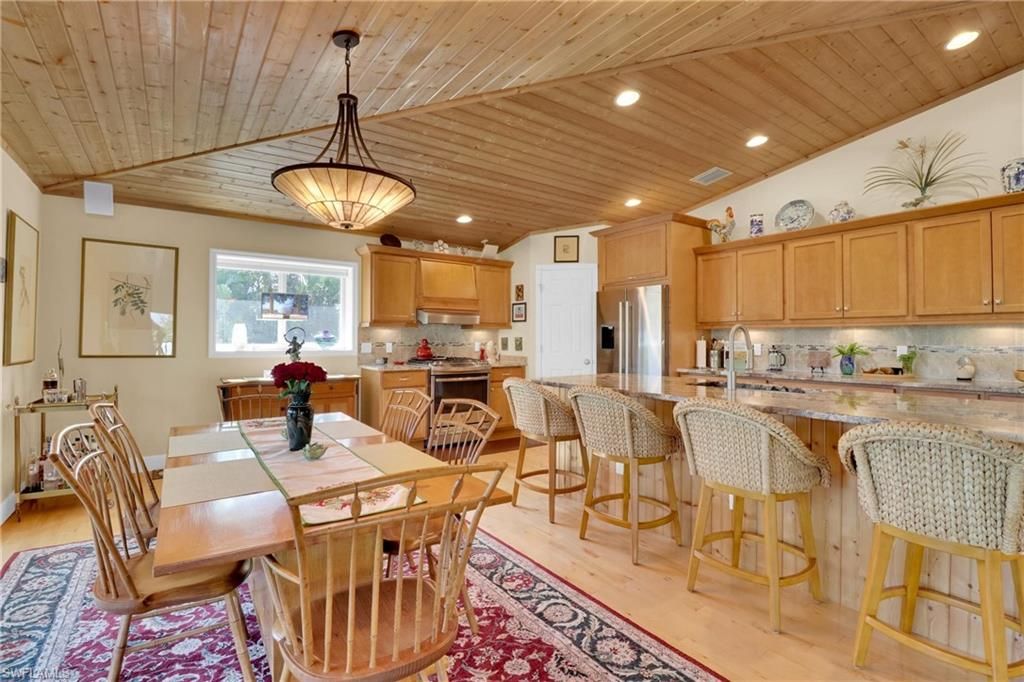 Dining room, Interior, Kitchen, Pendant Lights, Recessed Lighting, Stainless Steel Appliances, Wooden Ceilings, Wood Texture Flooring