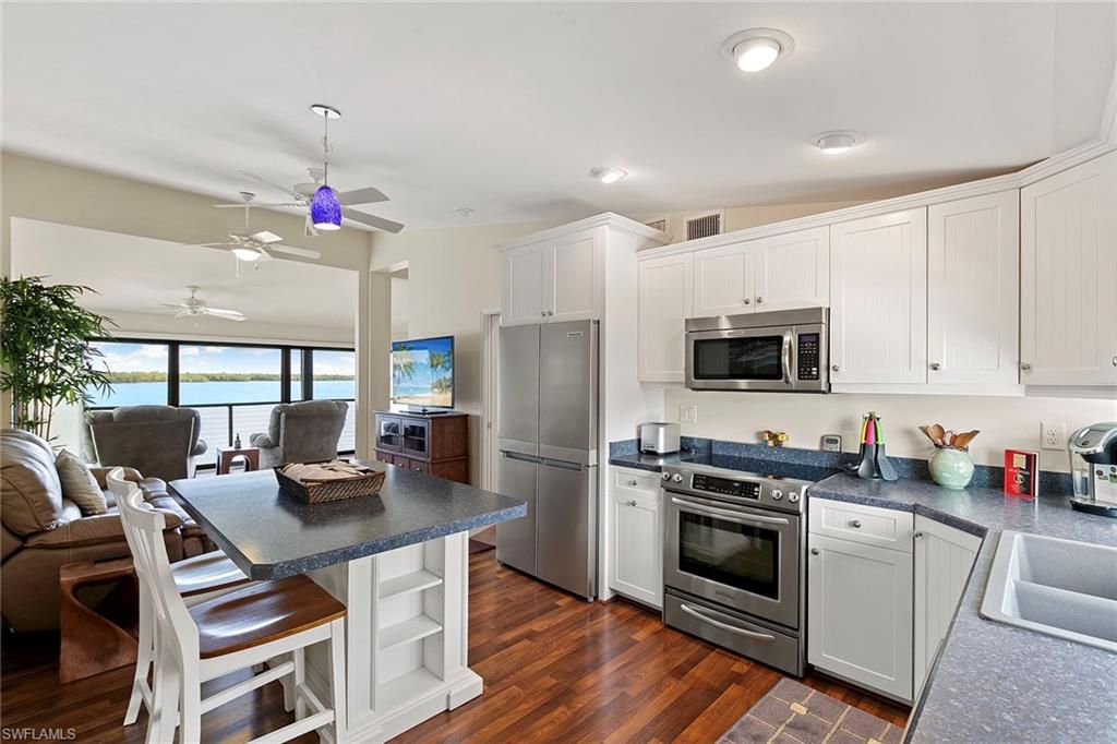 Interior, Kitchen, Recessed Lighting, Stainless Steel Appliances, Water, Wood Texture Flooring