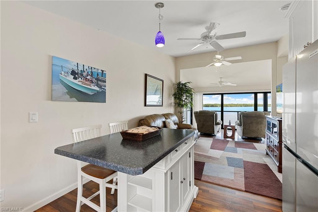 Dining room, Interior, Living room, Pendant Lights, Water, Wood Texture Flooring