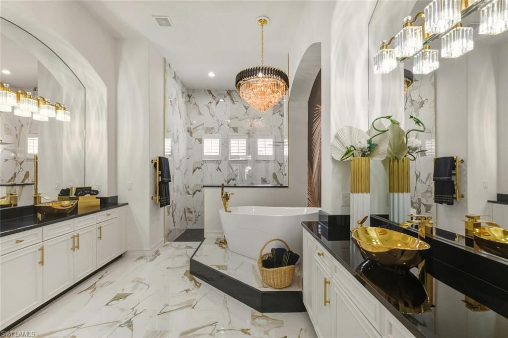 Bathroom, Chandelier, Dual Sink Vanities, Free Standing Baths, Interior, Marble, Marble Walls, Recessed Lighting