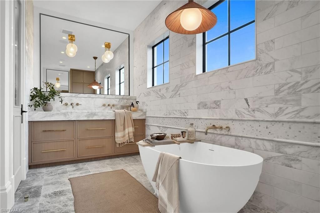 Bathroom, Free Standing Baths, Interior, Marble Walls, Pendant Lights, Recessed Lighting