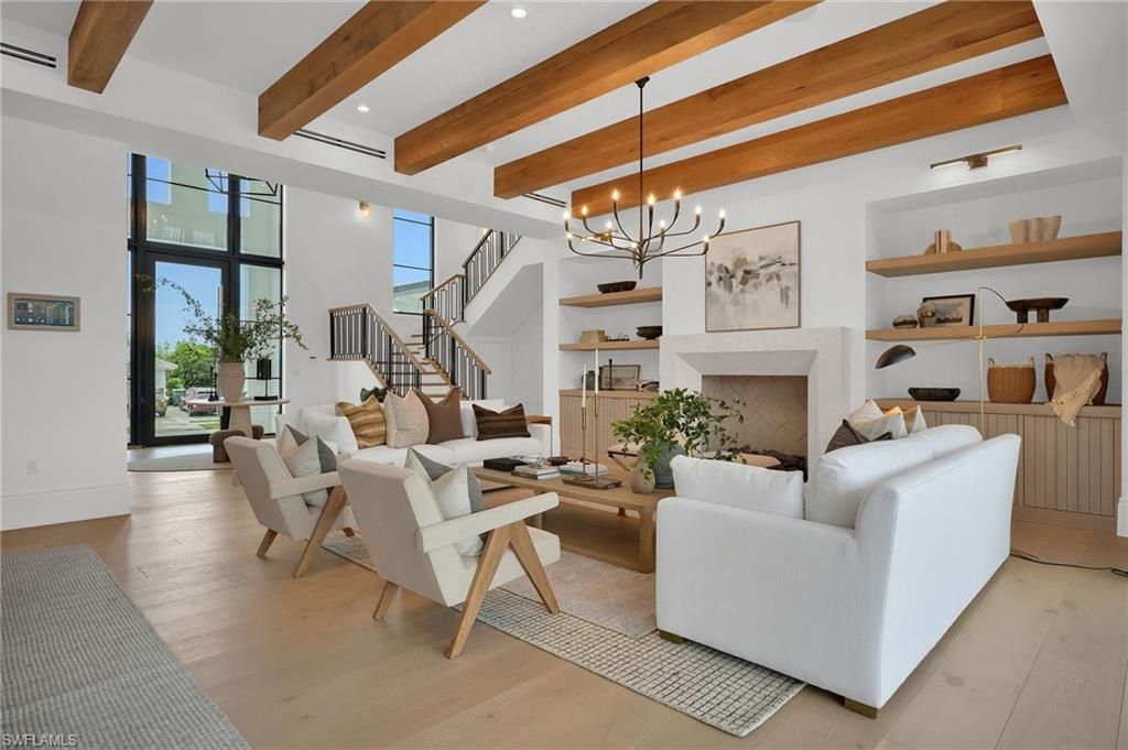 Chandelier, Fireplace, Interior, Living room, Recessed Lighting, Wooden Beams, Wood Texture Flooring