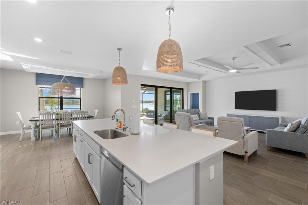 Dining room, Interior, Kitchen, Living room, Pendant Lights, Recessed Lighting, Water, Wood Texture Flooring