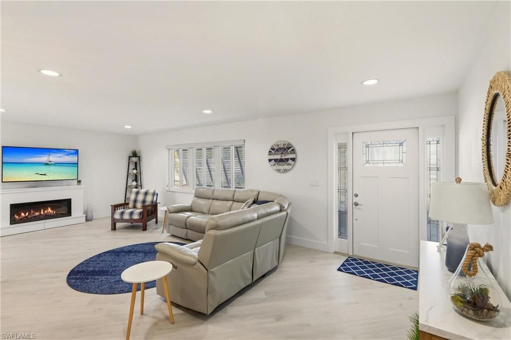 Fireplace, Interior, Living room, Recessed Lighting, Wood Texture Flooring