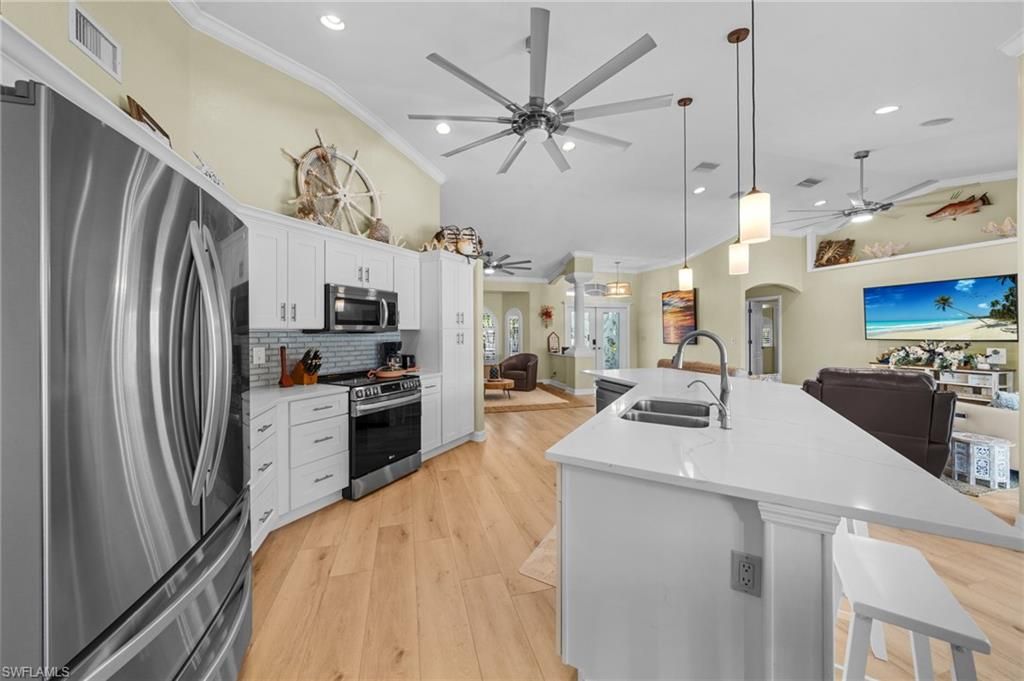 Interior, Kitchen, Pendant Lights, Recessed Lighting, Stainless Steel Appliances, Wood Texture Flooring