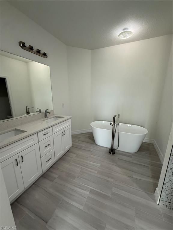 Bathroom, Dual Sink Vanities, Free Standing Baths, Interior, Wood Texture Flooring
