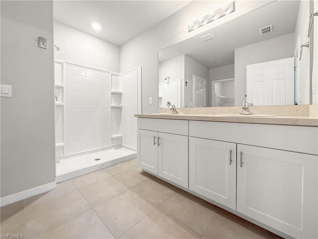 Bathroom, Dual Sink Vanities, Interior, Recessed Lighting, Walk-in Closets