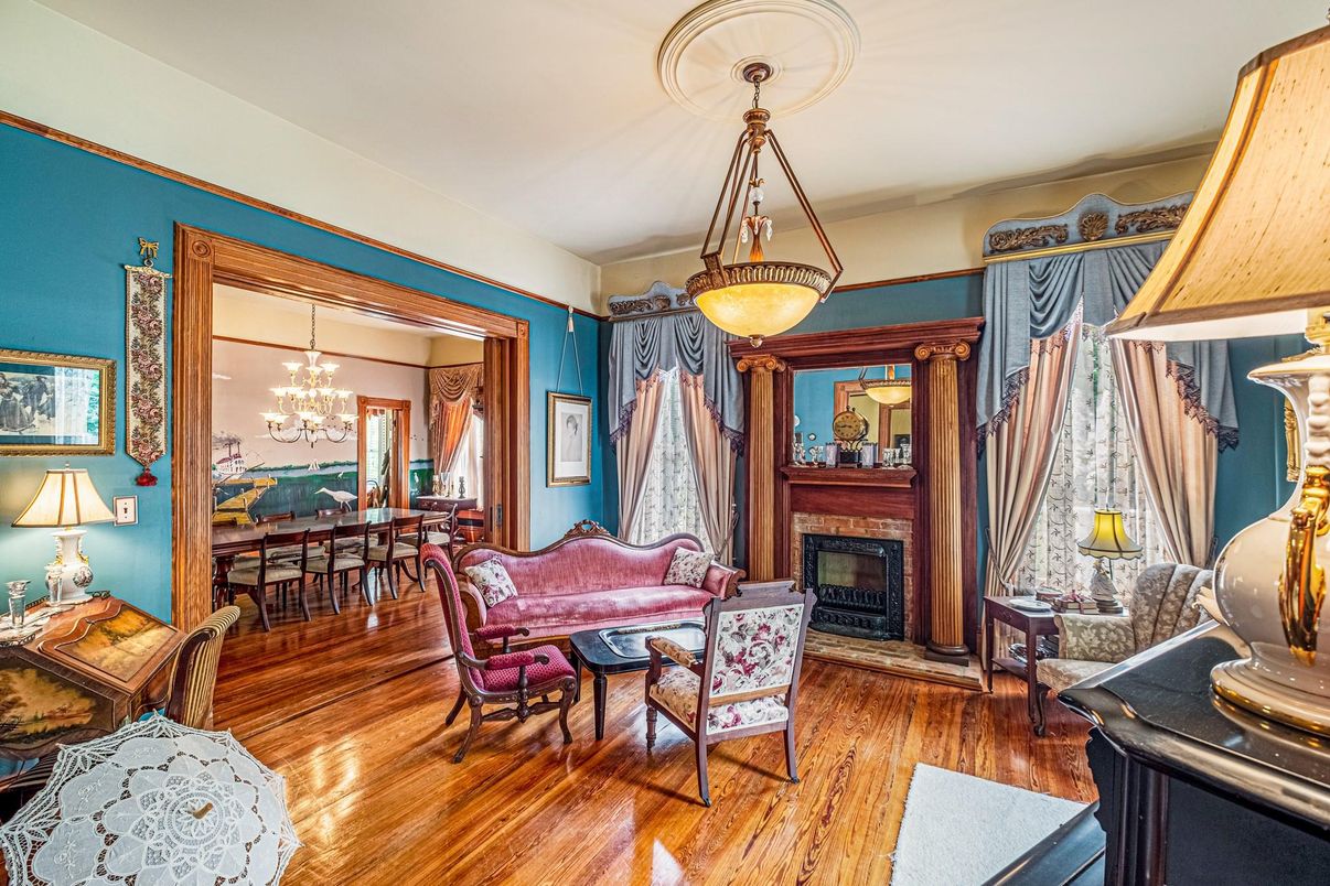 Chandelier, Dining room, Fireplace, Interior, Living room, Pendant Lights, Wood Texture Flooring