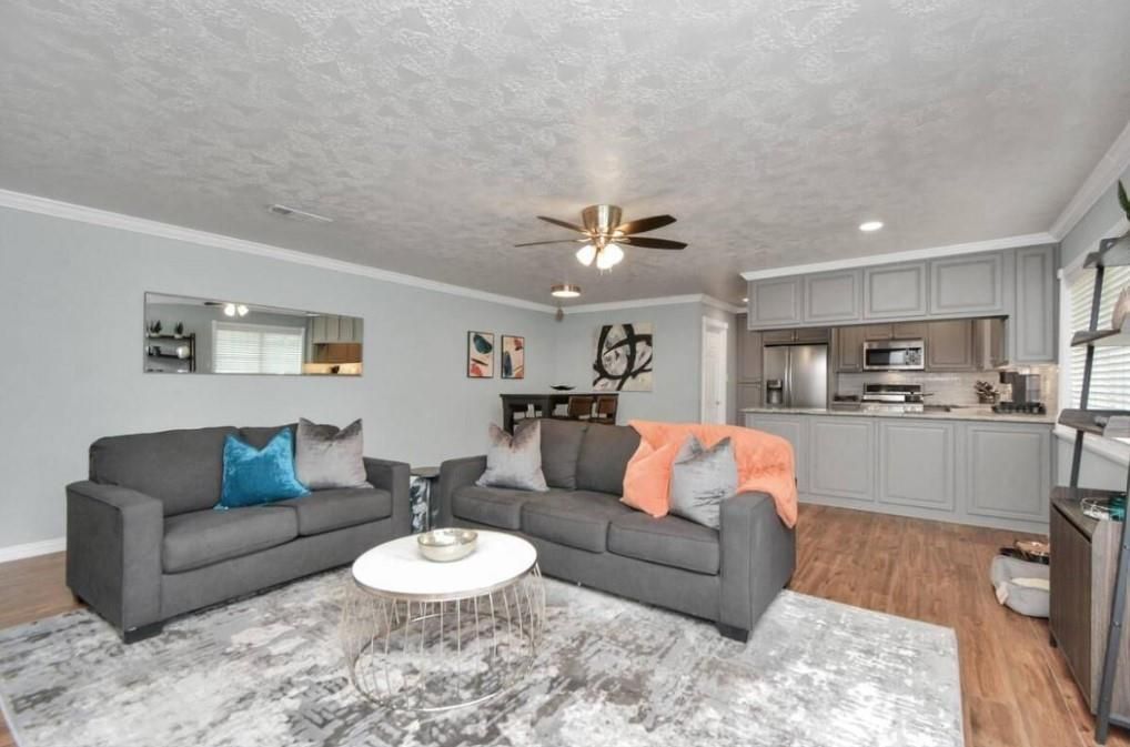 Dining room, Interior, Kitchen, Living room, Recessed Lighting, Stainless Steel Appliances, Wood Texture Flooring