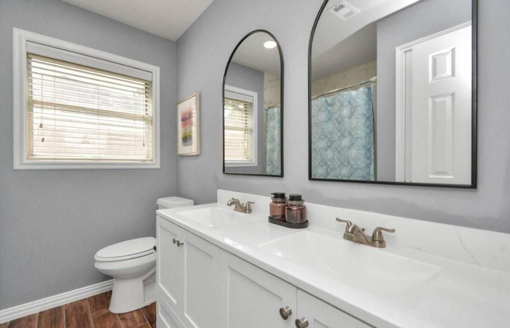 Bathroom, Dual Sink Vanities, Interior, Recessed Lighting, Wood Texture Flooring