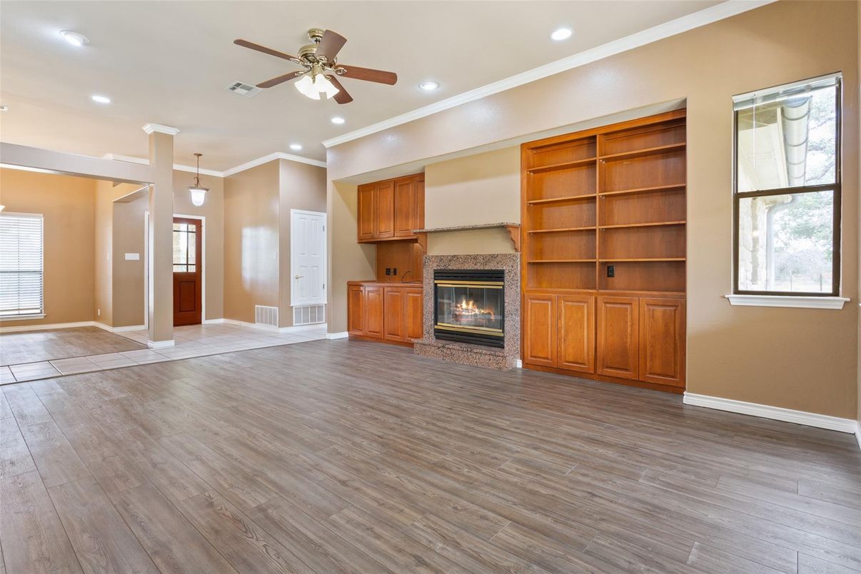 Empty room, Fireplace, Interior, Pendant Lights, Recessed Lighting, Wood Texture Flooring
