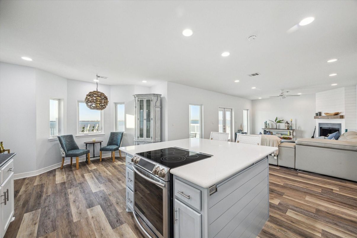 Fireplace, Interior, Kitchen, Living room, Pendant Lights, Recessed Lighting, Wood Texture Flooring