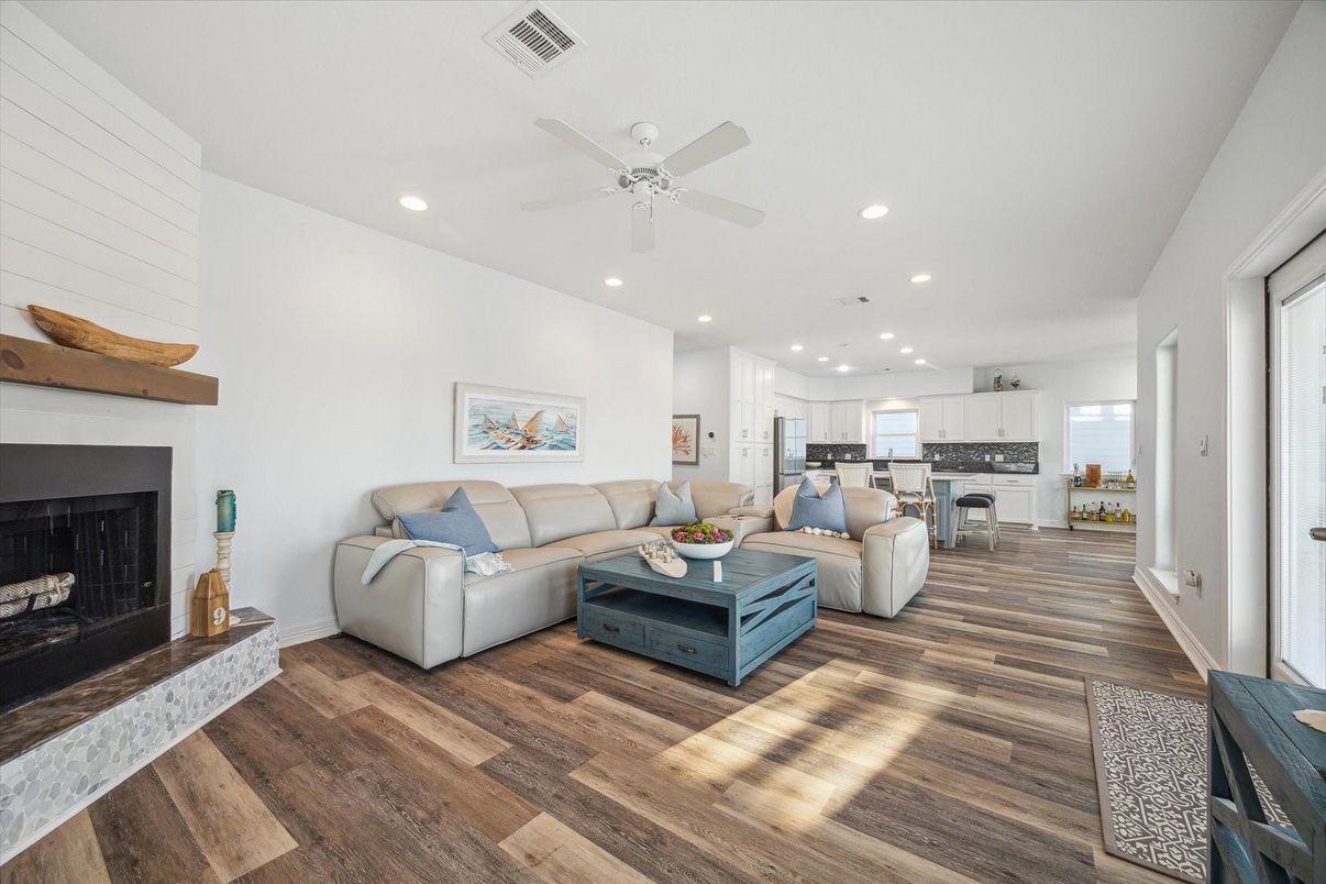 Fireplace, Interior, Kitchen, Living room, Recessed Lighting, Wood Texture Flooring