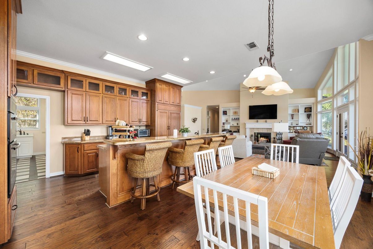 Dining room, Fireplace, Interior, Kitchen, Living room, Pendant Lights, Recessed Lighting, Wood Texture Flooring