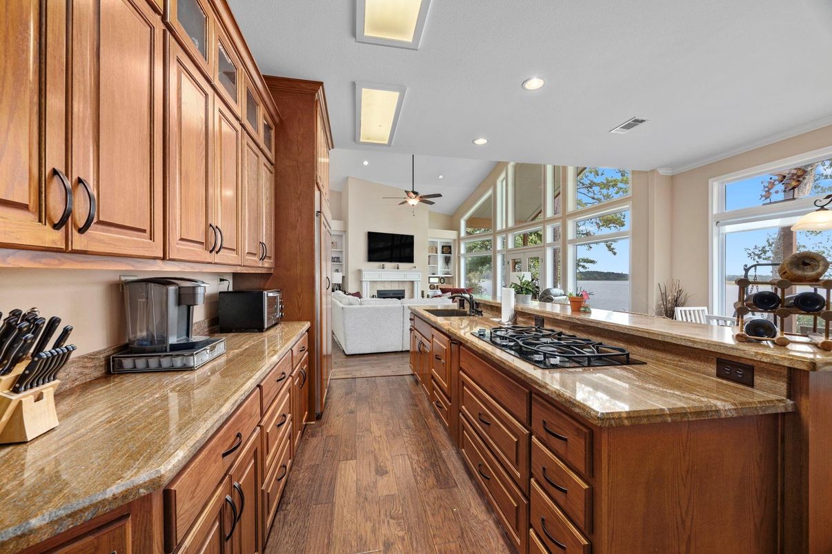 Fireplace, Interior, Kitchen, Living room, Recessed Lighting, Wood Texture Flooring