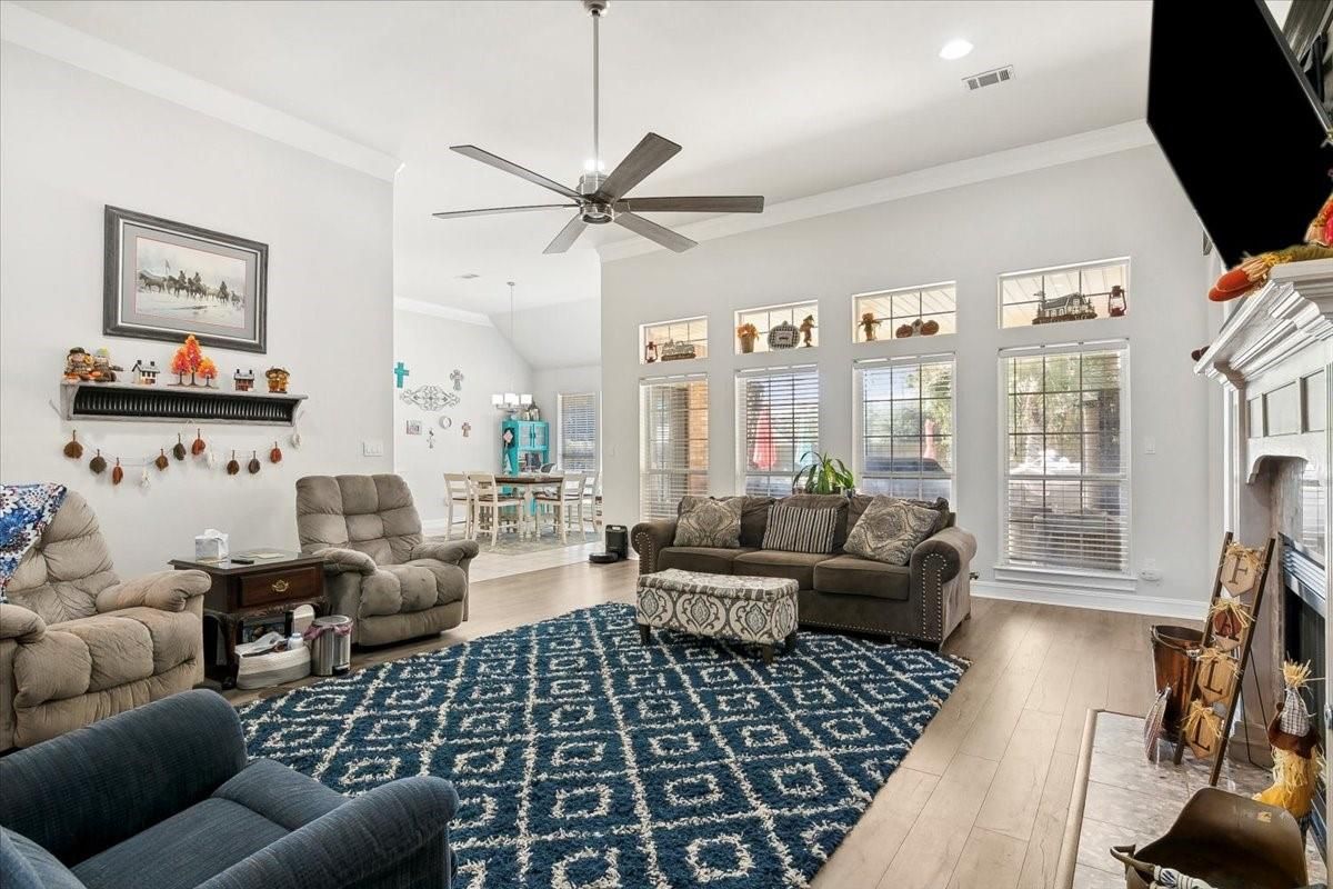 Chandelier, Dining room, Fireplace, Interior, Living room, Recessed Lighting, Wood Texture Flooring