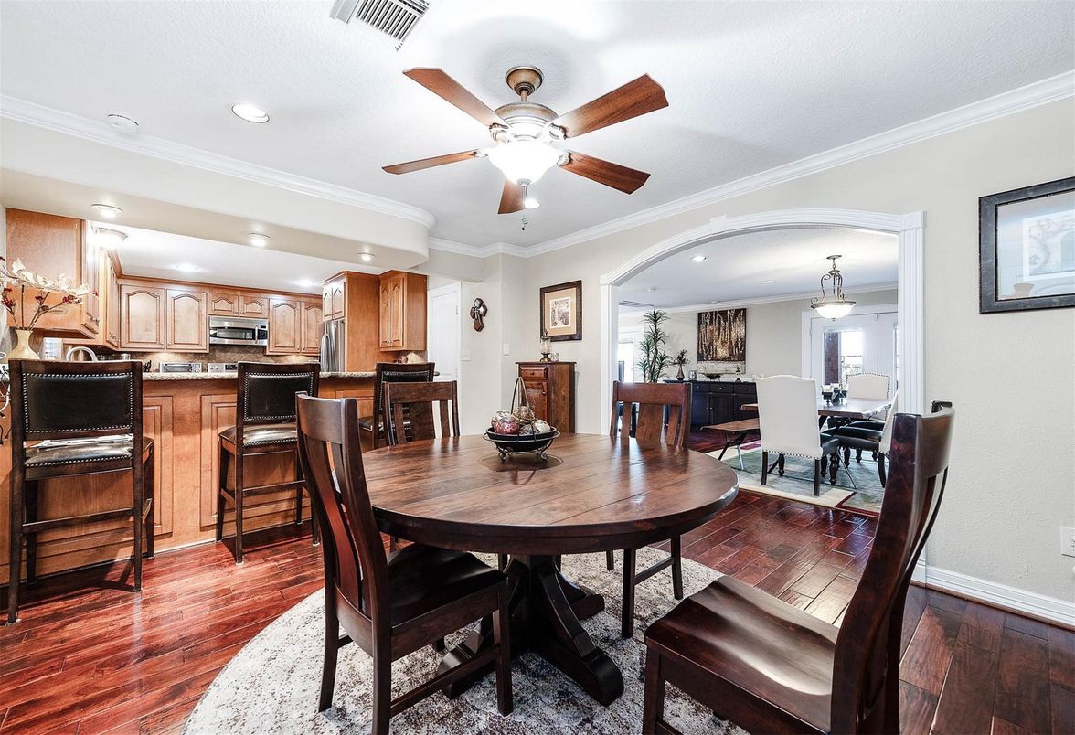 Chandelier, Dining room, Interior, Kitchen, Recessed Lighting, Stainless Steel Appliances, Wood Texture Flooring
