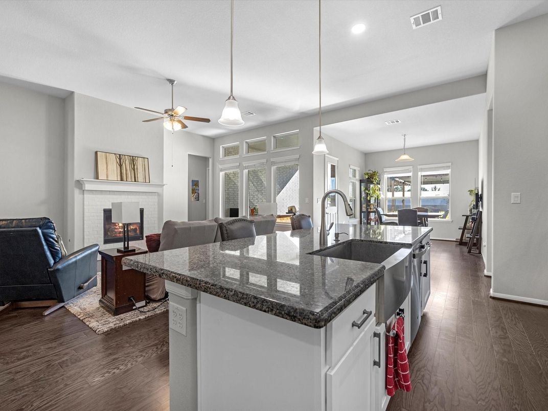 Dining room, Fireplace, Interior, Kitchen, Living room, Pendant Lights, Recessed Lighting, Wood Texture Flooring