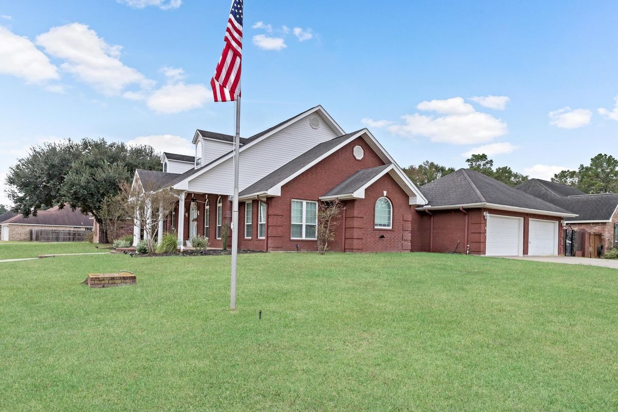 Attached, Backyard, Exterior, Facade, Brick Facade, Brick Traditional