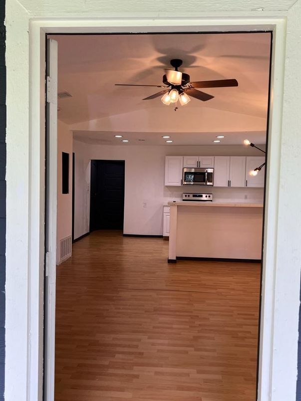 Interior, Kitchen, Recessed Lighting, Stainless Steel Appliances, Wood Texture Flooring