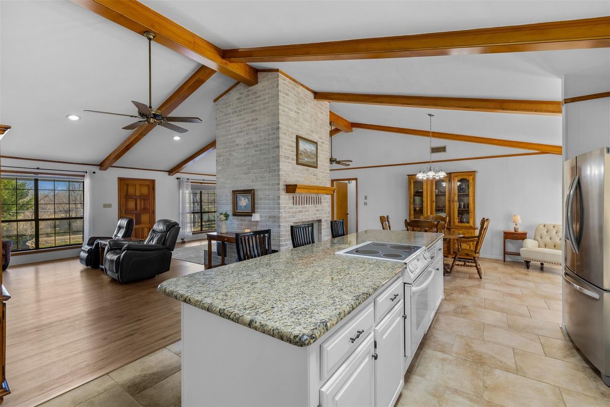 Dining room, Fireplace, Interior, Kitchen, Living room, Pendant Lights, Recessed Lighting, Stone Walls, Wooden Beams, Wood Texture Flooring