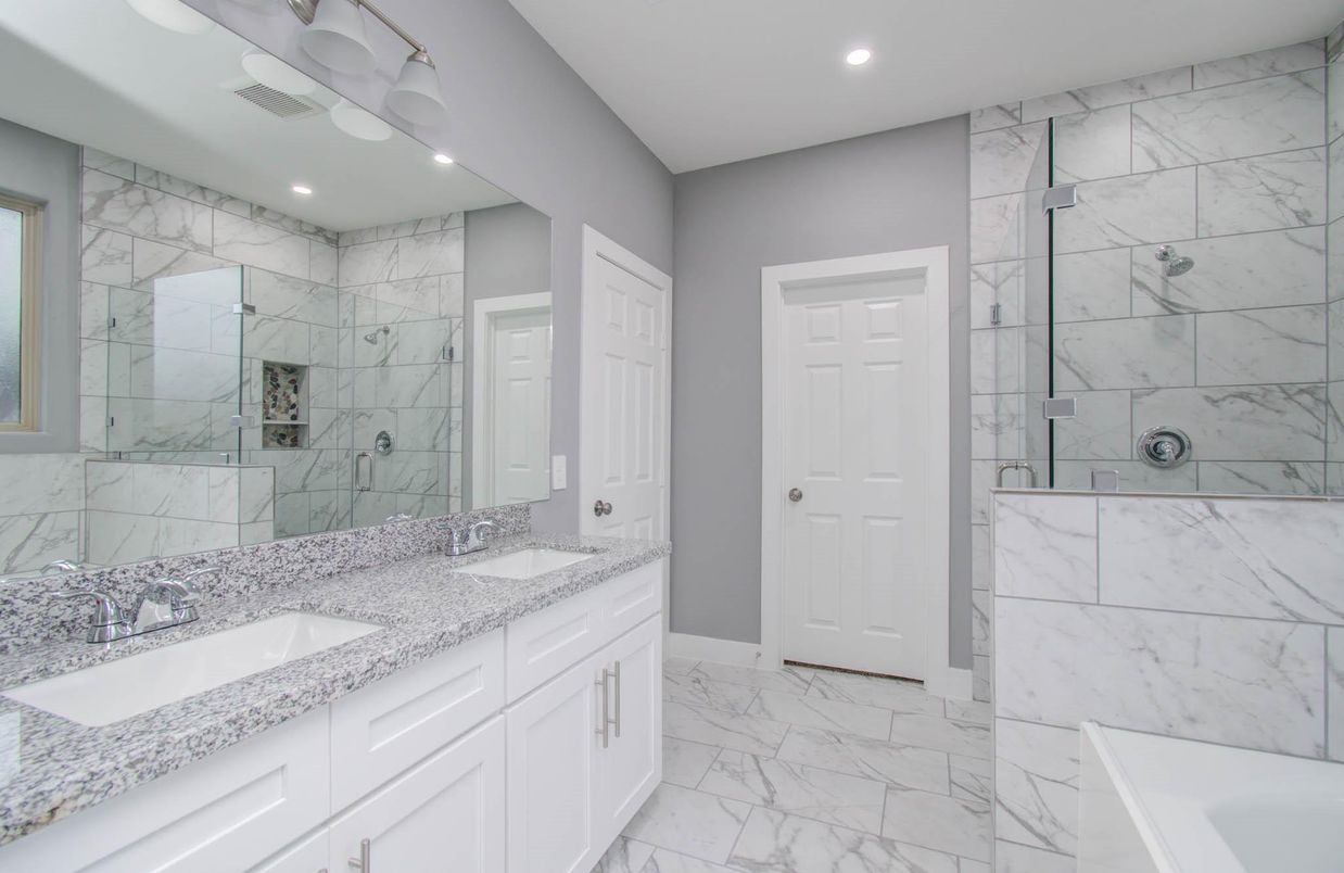 Bathroom, Dual Sink Vanities, Glass Shower, Interior, Marble, Marble Walls, Recessed Lighting
