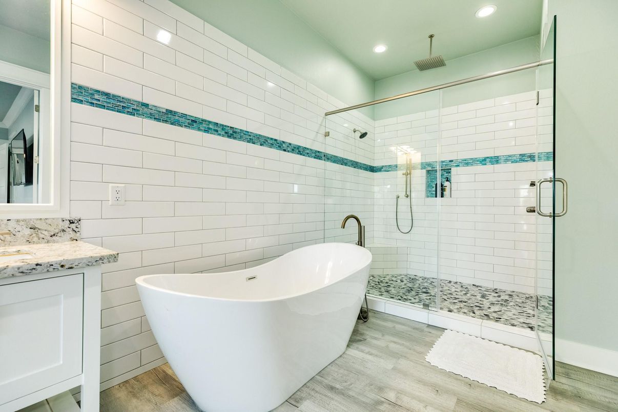 Bathroom, Free Standing Baths, Glass Shower, Interior, Recessed Lighting, Wood Texture Flooring