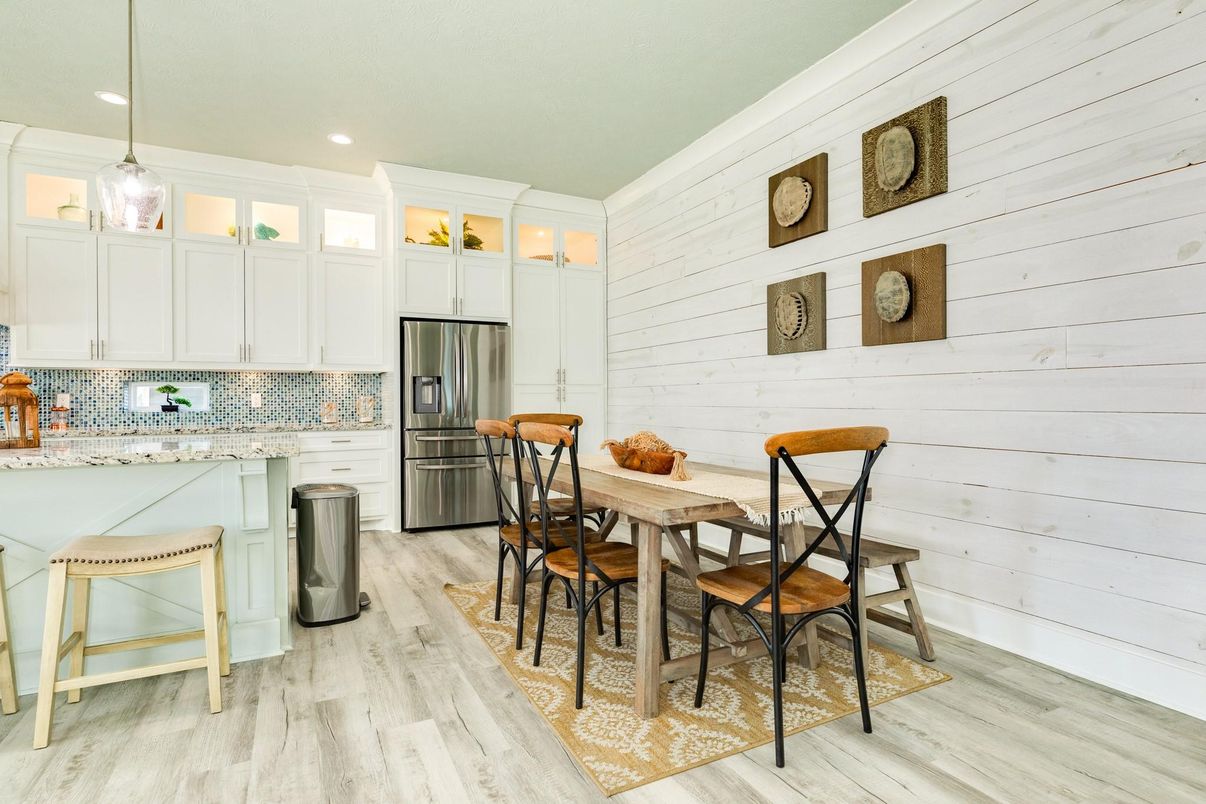 Dining room, Interior, Kitchen, Pendant Lights, Recessed Lighting, Stainless Steel Appliances, Wood Texture Flooring