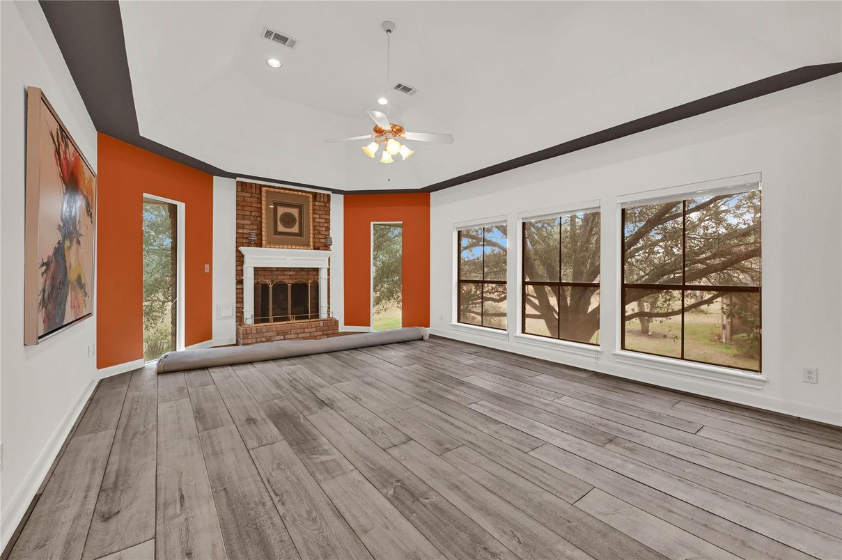 Empty room, Fireplace, Interior, Recessed Lighting, Wood Texture Flooring
