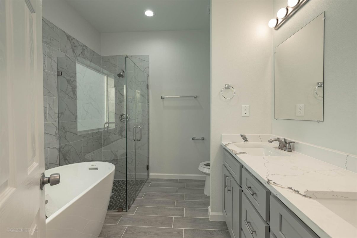 Bathroom, Free Standing Baths, Glass Shower, Interior, Marble Walls, Recessed Lighting