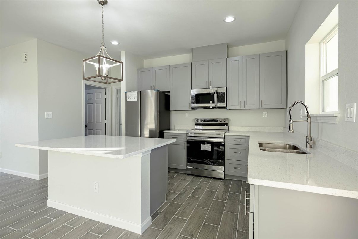Interior, Kitchen, Pendant Lights, Recessed Lighting, Stainless Steel Appliances, Wood Texture Flooring