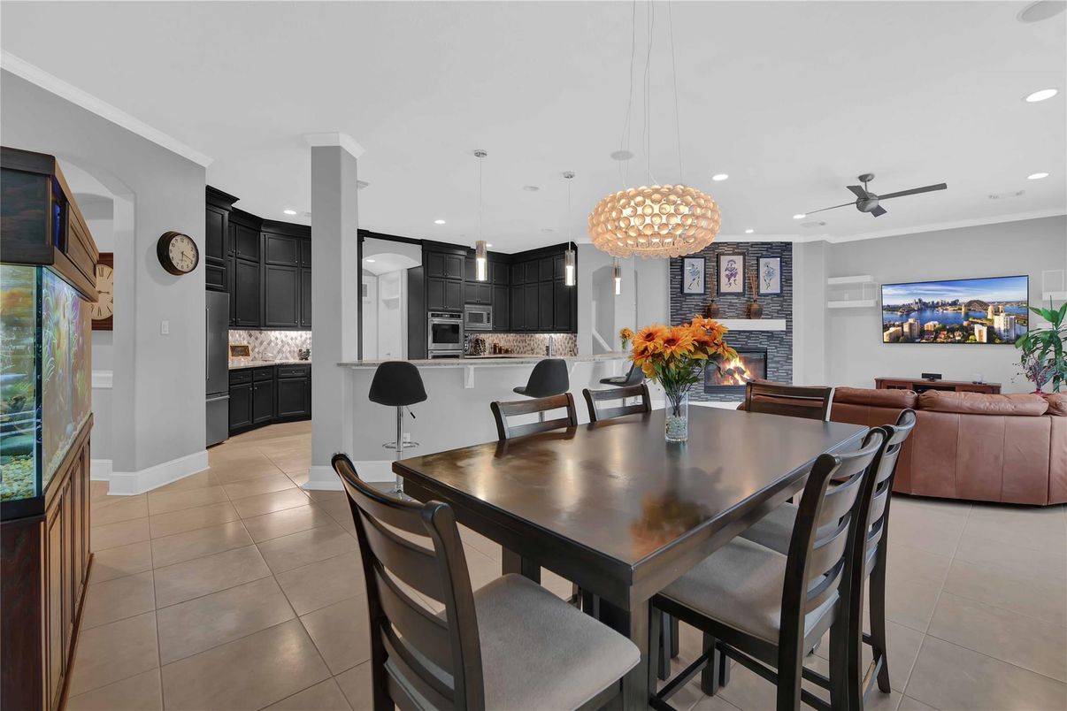 Dining room, Fireplace, Interior, Kitchen, Living room, Pendant Lights, Recessed Lighting, Stainless Steel Appliances