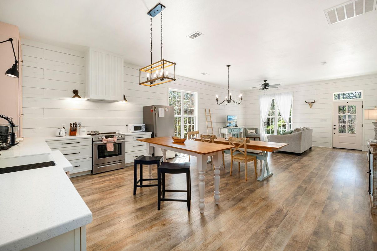 Dining room, Interior, Kitchen, Living room, Pendant Lights, Stainless Steel Appliances, Wood Texture Flooring
