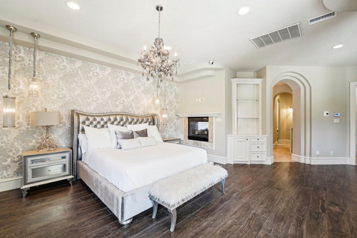 Bedroom, Chandelier, Fireplace, Interior, Pendant Lights, Recessed Lighting, Wood Texture Flooring