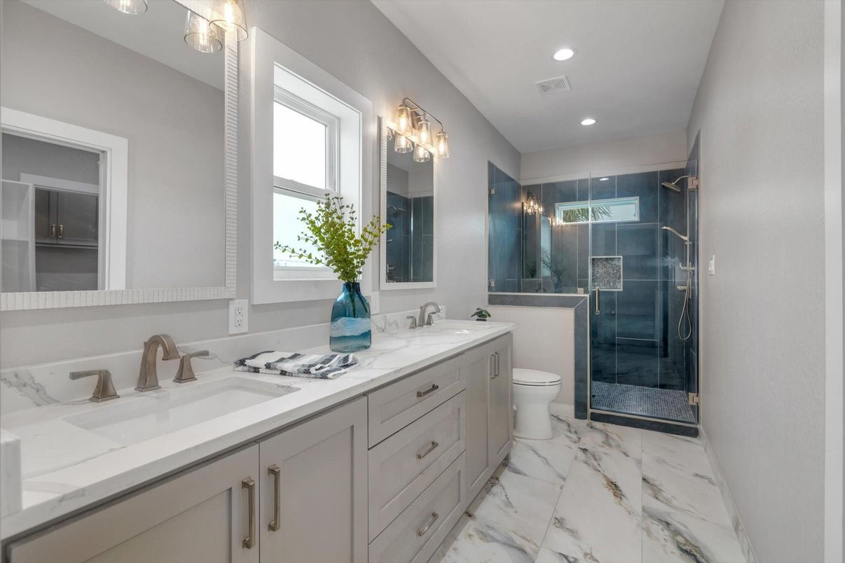 Bathroom, Dual Sink Vanities, Glass Shower, Interior, Marble, Recessed Lighting