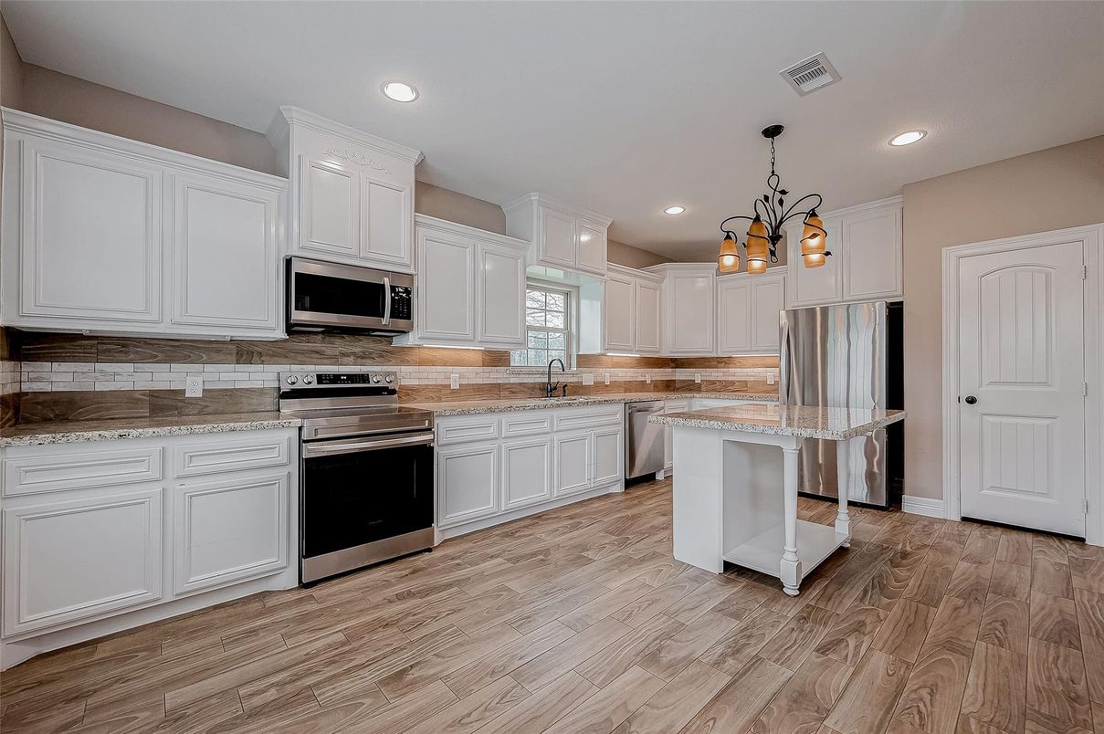 Chandelier, Interior, Kitchen, Pendant Lights, Recessed Lighting, Stainless Steel Appliances, Wood Texture Flooring