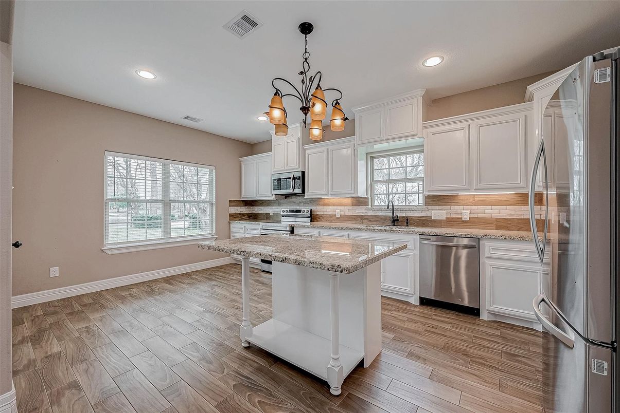 Chandelier, Interior, Kitchen, Recessed Lighting, Stainless Steel Appliances, Wood Texture Flooring