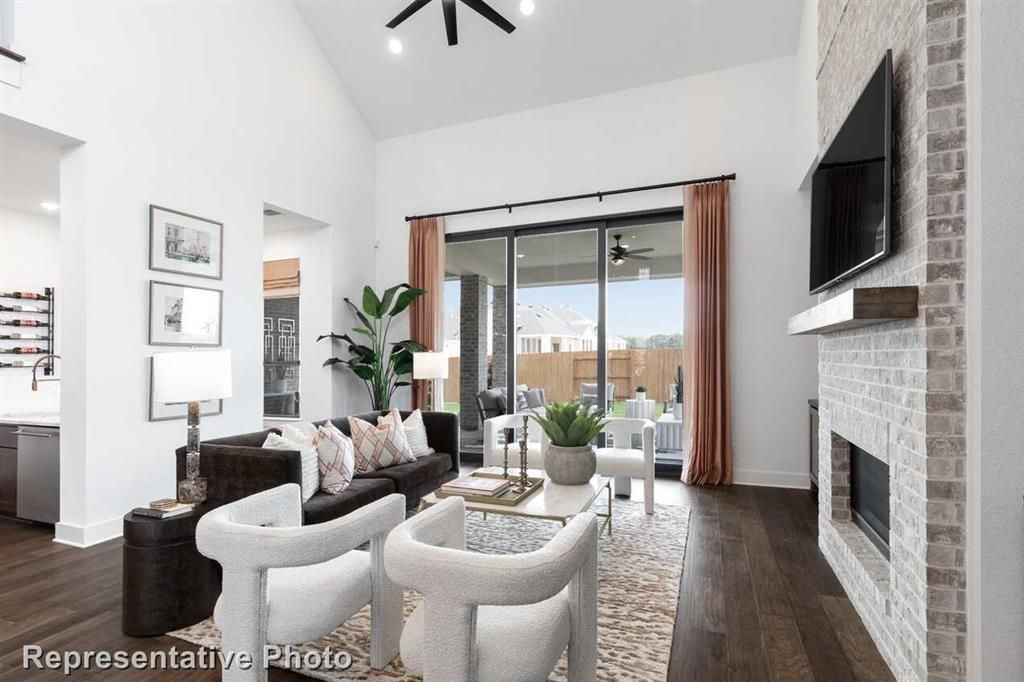 Fireplace, Interior, Living room, Recessed Lighting, Stone Walls, Wood Texture Flooring