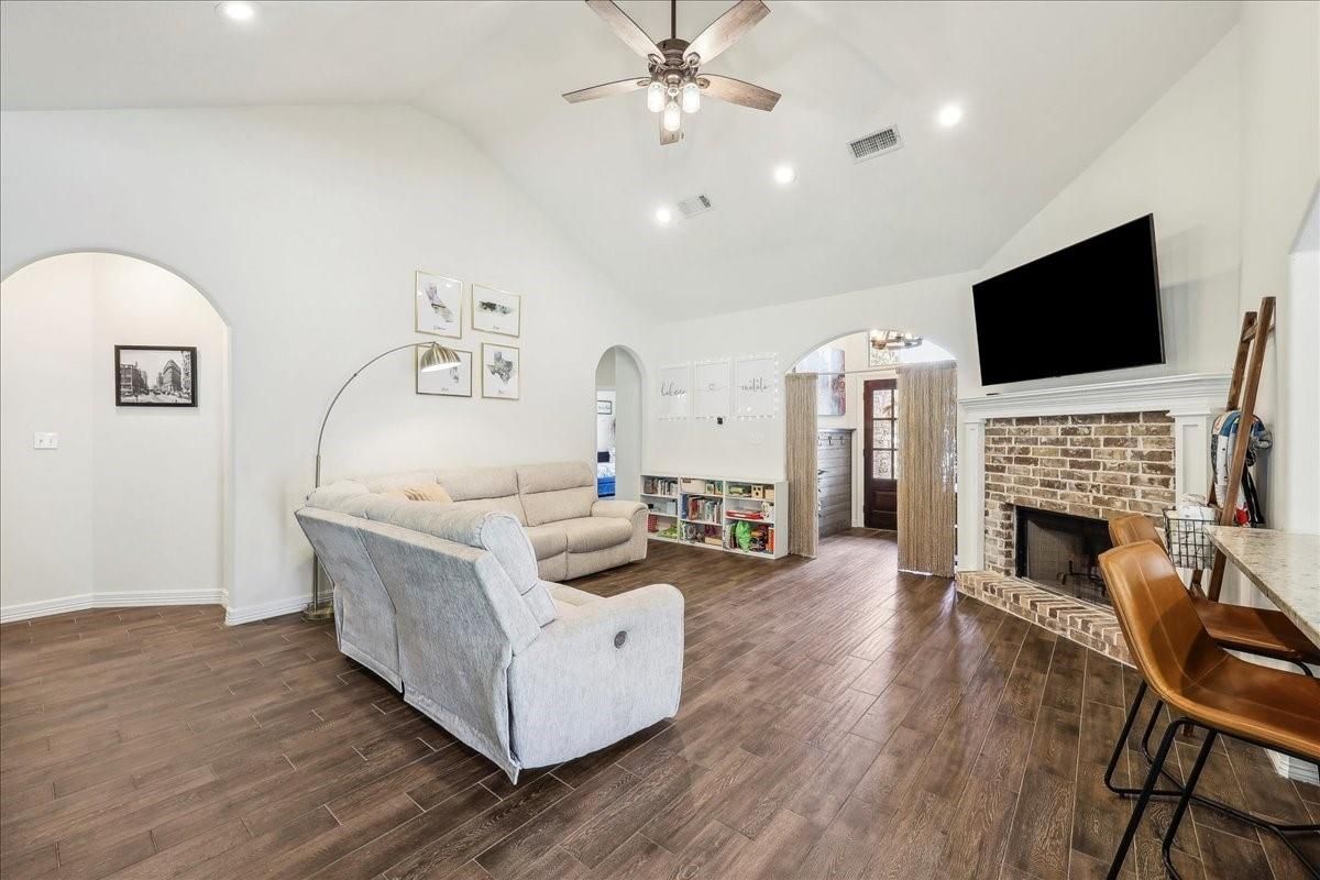 Chandelier, Fireplace, Interior, Living room, Recessed Lighting, Wood Texture Flooring