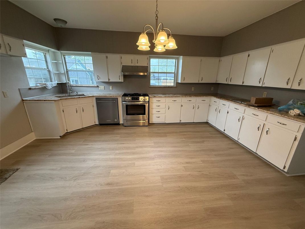 Interior, Kitchen, Pendant Lights, Stainless Steel Appliances, Wood Texture Flooring