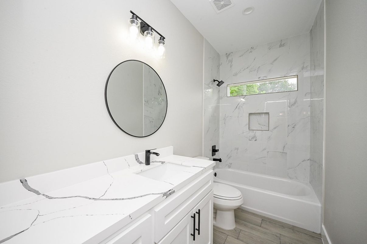 Bathroom, Dual Sink Vanities, Interior, Marble Walls, Wood Texture Flooring