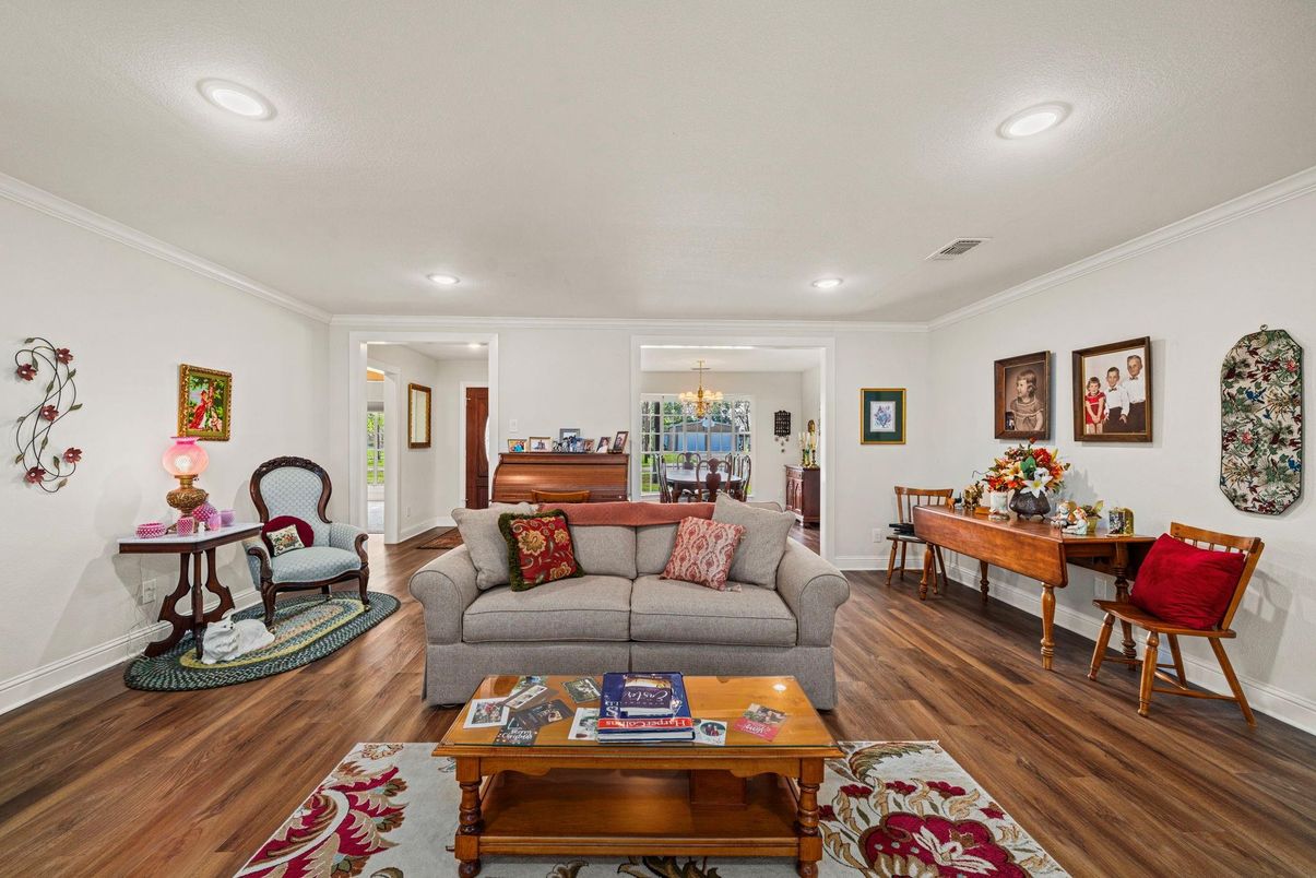 Chandelier, Dining room, Interior, Living room, Piano, Recessed Lighting, Wood Texture Flooring