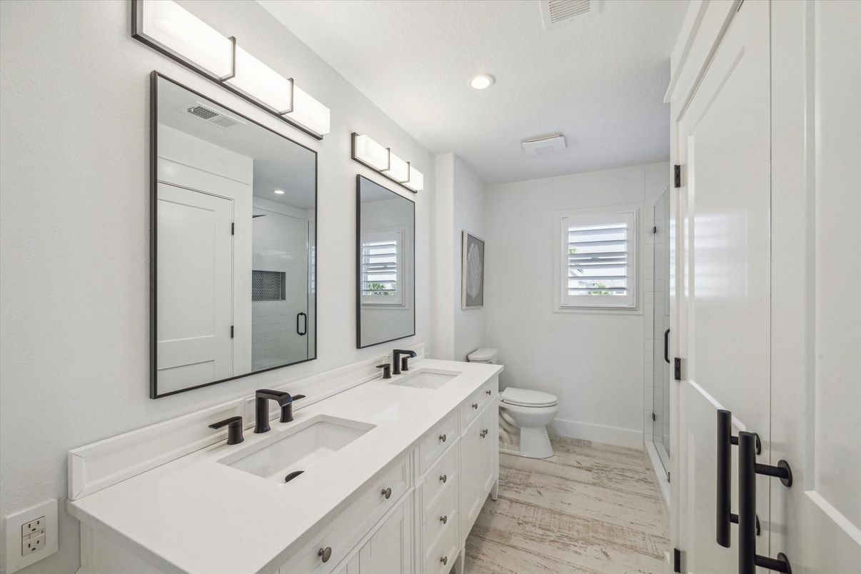 Bathroom, Dual Sink Vanities, Interior, Recessed Lighting, Wood Texture Flooring