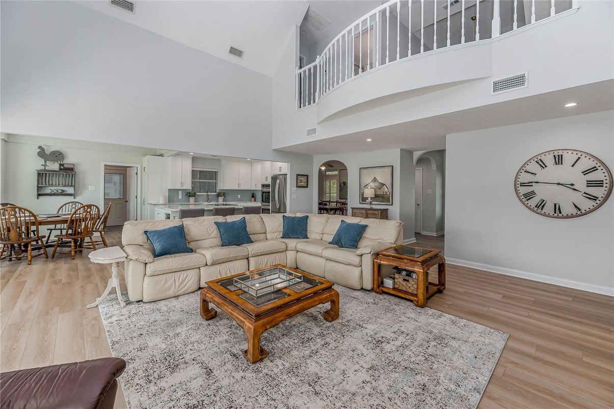 Dining room, Interior, Kitchen, Living room, Recessed Lighting, Stainless Steel Appliances, Wood Texture Flooring
