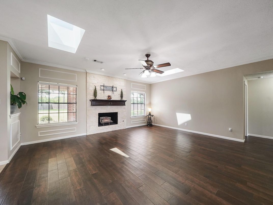 Empty room, Fireplace, Interior, Recessed Lighting, Wood Texture Flooring